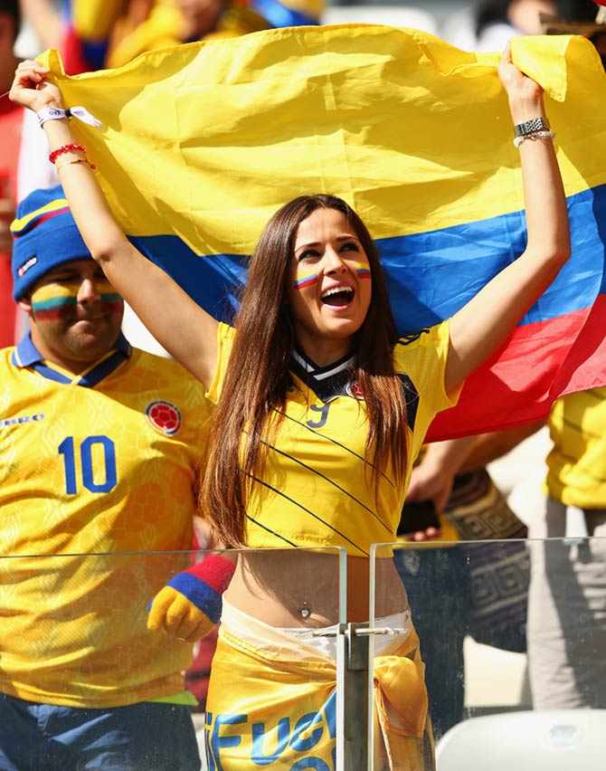 A Colombia fan cheers during the World Cup match against Japan in Cuiaba.