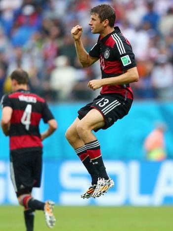 Thomas Mueller celebrates scoring for Germany against the United States