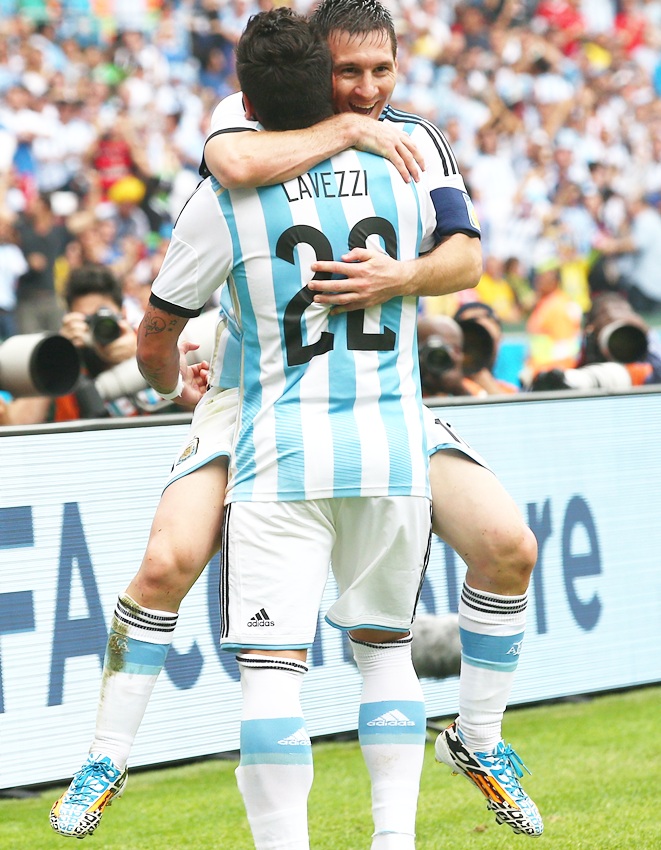 Lionel Messi of Argentina celebrates scoring his team's second goalwith Ezequiel Lavezzi