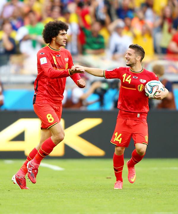 Belgium's goal-scorers Marouane Fellaini (left) and Dries Mertens celebrate after the victory over Algeria in Tuesday's World Cup match