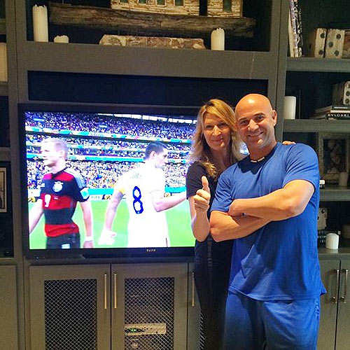 Steffi Graf and husband Andre Agassi look satisfied after the U.S.-Germany match on Thursday