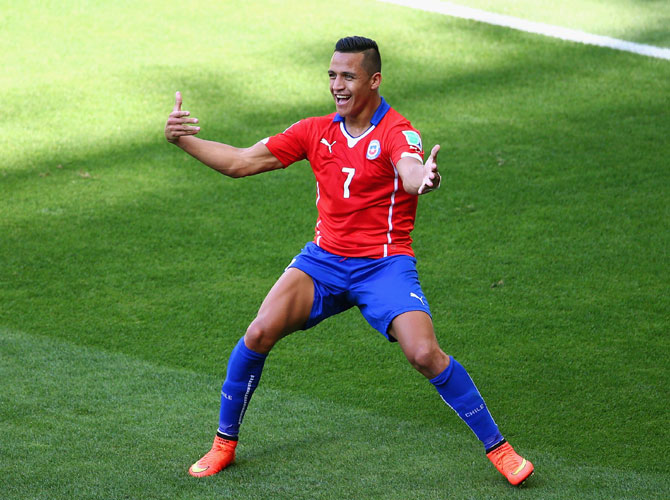 Alexis Sanchez of Chile celebrates scoring his team's first goal