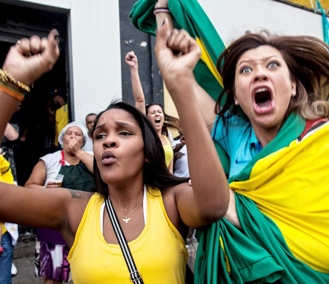Fans watch the Round of 16 match between Brazil and Chile