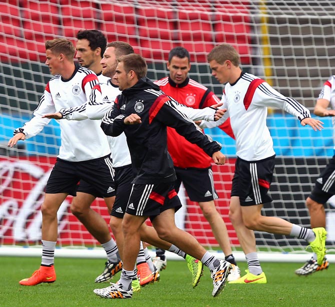 Germany's players warm up during a training session