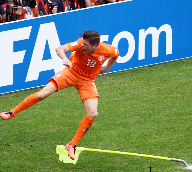 Klaas-Jan Huntelaar of the Netherlands celebrates scoring his team's second goal on a penalty kick in stoppage time