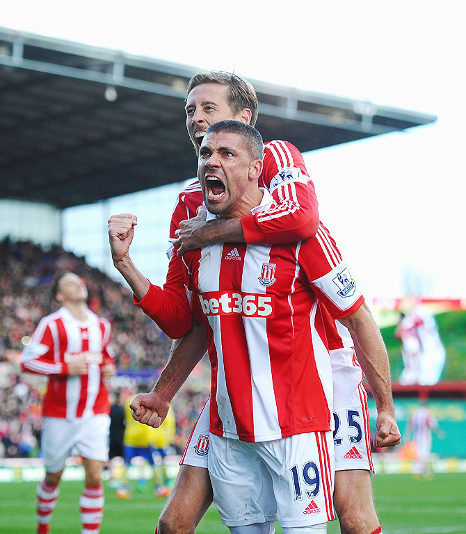 Jonathan Walters of Stoke City celebrates his goal with Peter Crouch during their Premier League match against Arsenal on Saturday