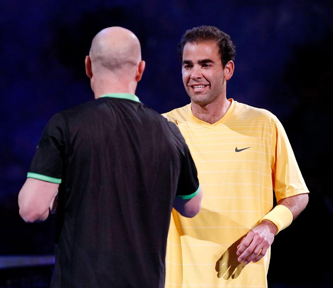 Pete Sampras (right) with Andre Agassi