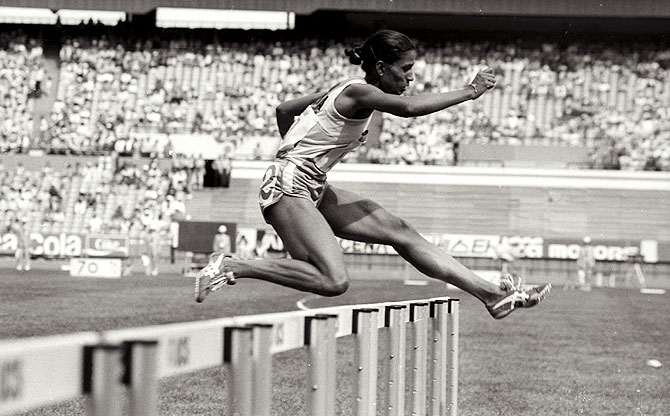 P T Usha clears a hurdle on her way to the gold medal and first place in the women's 400 metres hurdles at the Asian Games in Seoul, September 30, 1986