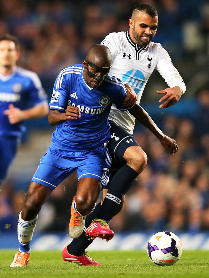 Ramires of Chelsea and Sandro of Spurs battle for the ball.