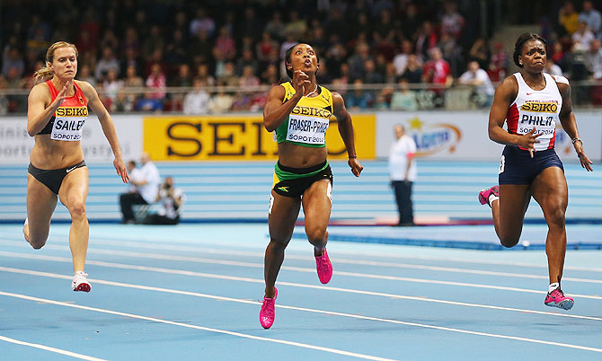 Shelly-Ann Fraser-Pryce of Jamaica competes on way to winning the gold medal, beating Verena Sailer (left) of Germany and Asha Philip of Great Britain in the Women's 60m final during day three of the IAAF World Indoor Championships on Sunday