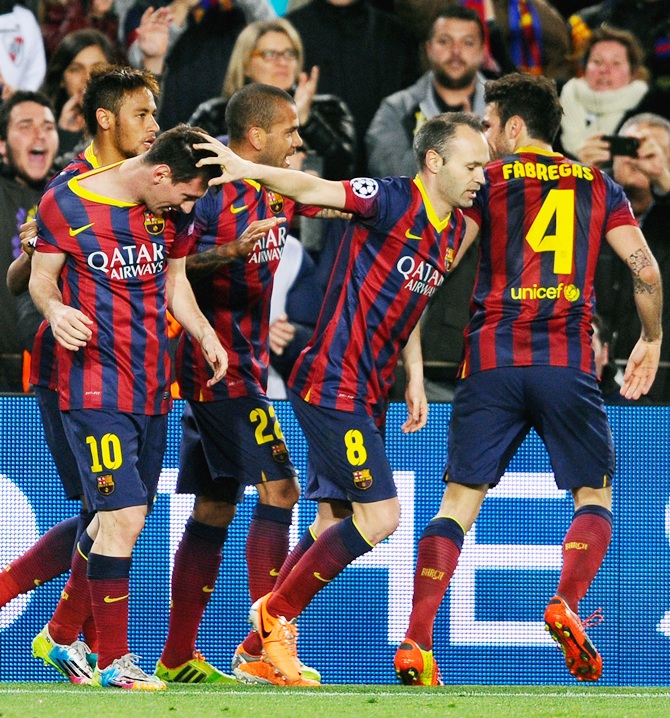 From left, Lionel Messi of Barcelona celebrates with   teammates Neymar, Daniel Alves, Andres Iniesta and Cesc Fabregas after scoring the opening goal