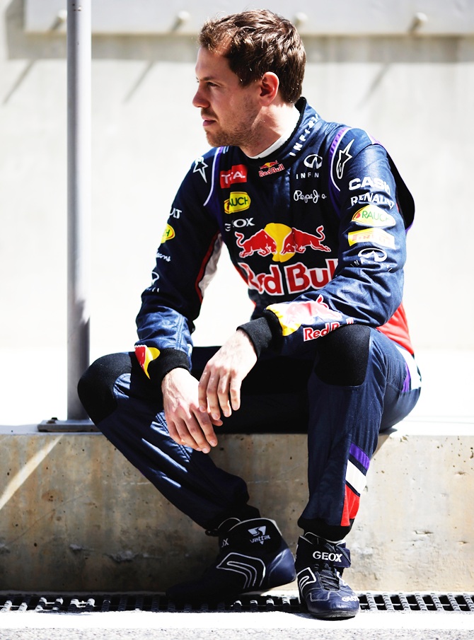 Sebastian Vettel of Germany and Infiniti Red Bull Racing poses