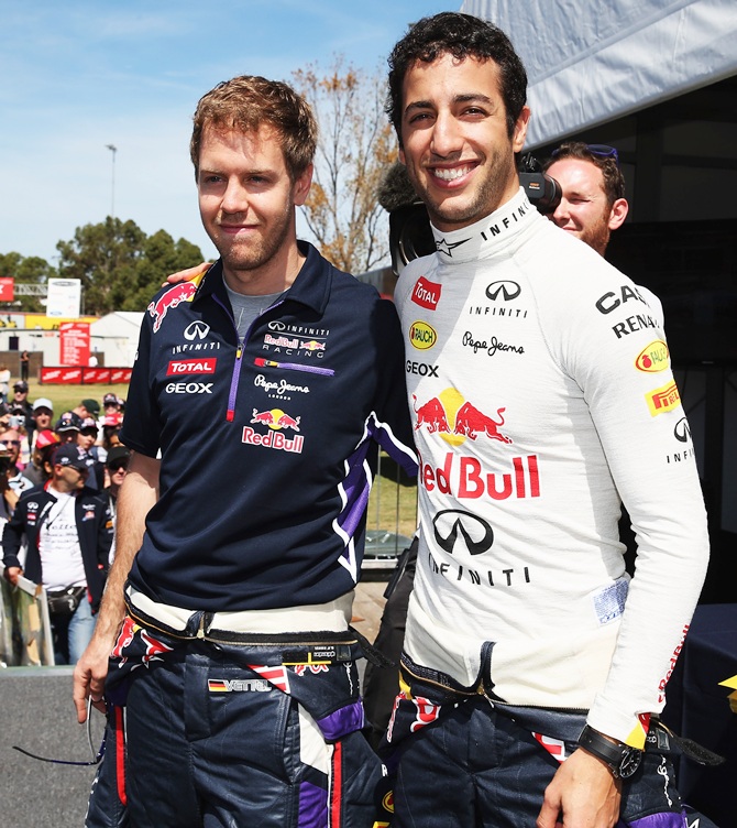 Sebastian Vettel, left, with Daniel Ricciardo 