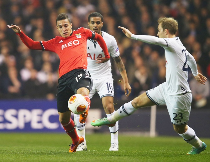 Rodrigo Moreno of Benfica battles with Christian Eriksen of Tottenham Hotspur during the UEFA Europa League match