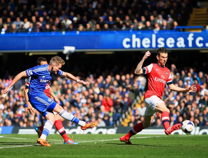 Andre Schurrle of Chelsea scores their second goal 