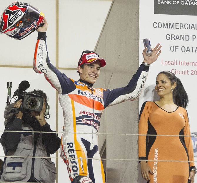 Marc Marquez of Spain and Repsol Honda Team celebrates the victory on the podium at the end of the MotoGP race