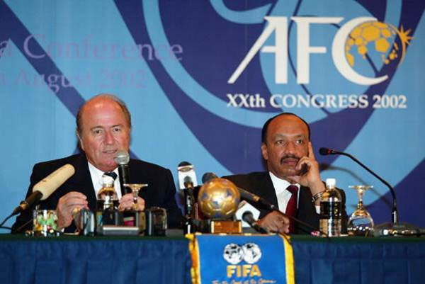 Sepp Blatter, FIFA president and Mohamed bin Hammam, ex-president of the Asian Football Confederation during a press conference at the 2002 AFC Congress