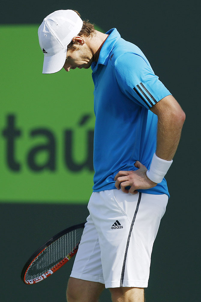 Andy Murray reacts during his match against Novak Djokovic
