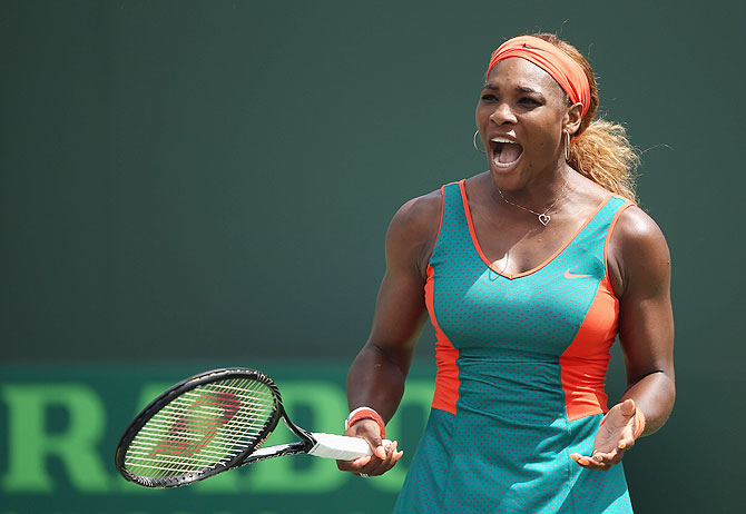 Serena Williams of the United States reacts during her match against Maria Sharapova of Russia on Thursday