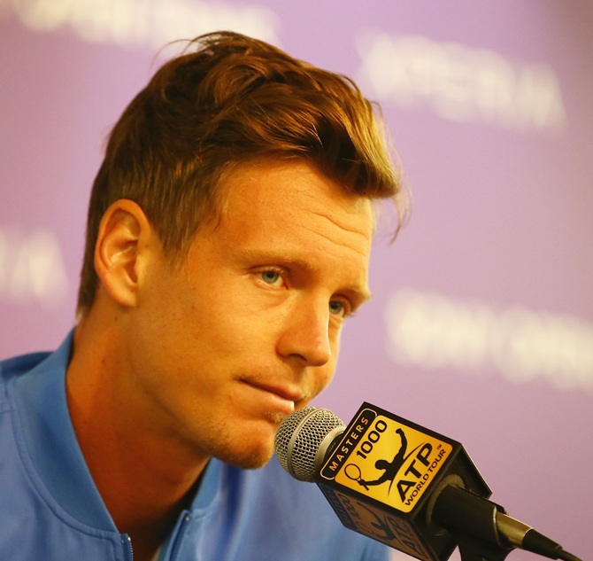 Tomas Berdych speaks to the media after withdrawing