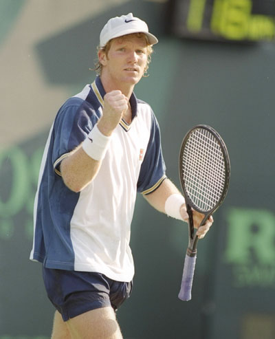 Jim Courier of the United States celebrates winning a match