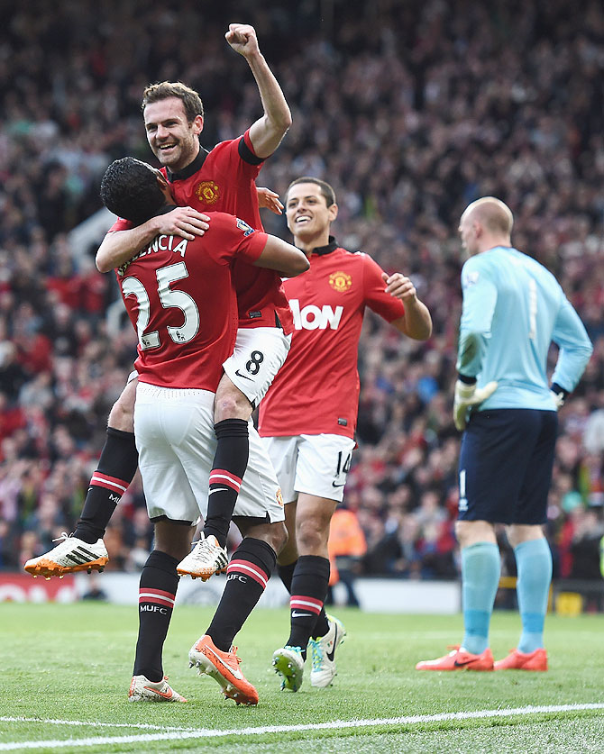 Juan Mata of Manchester United celebrates scoring against Norwich City at Old Trafford 