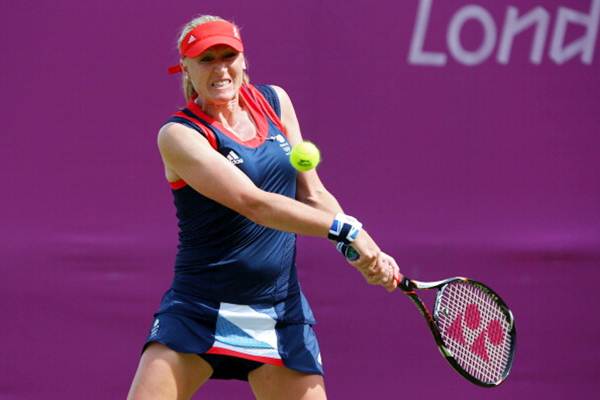 Elena Baltacha of Great Britain returns a shot against Agnes Szavay of Hungary during the women's singles match on Day 1 of the London 2012 Olympic Games