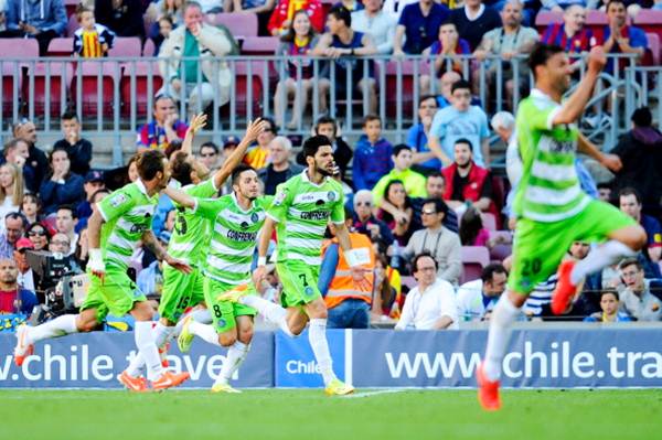 Angel Latifa (centre) of Getafe celebrates after scoring his team's second goal