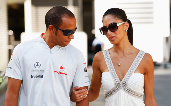 Lewis Hamilton of Great Britain and McLaren Mercedes and his girlfriend Nicole Scherzinger