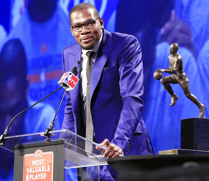 Oklahoma City Thunder player Kevin Durant speaks after receiving the MVP trophy