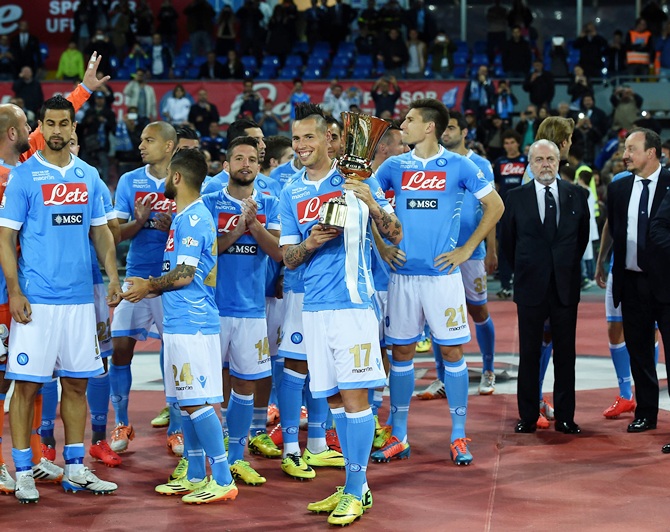Marek Hamsik of Napoli poses with the Tim Cup next to his team-mates