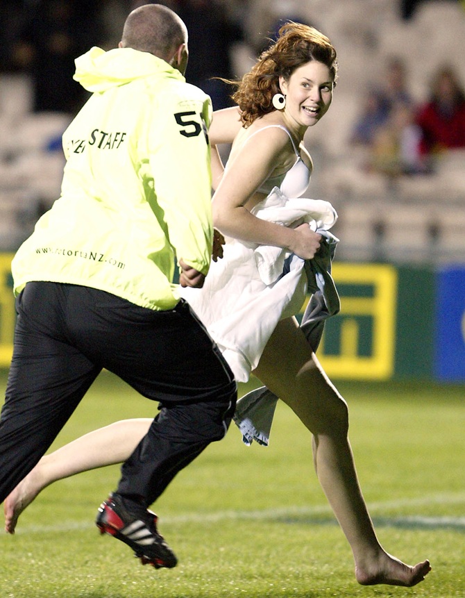 A pitch invader evades police