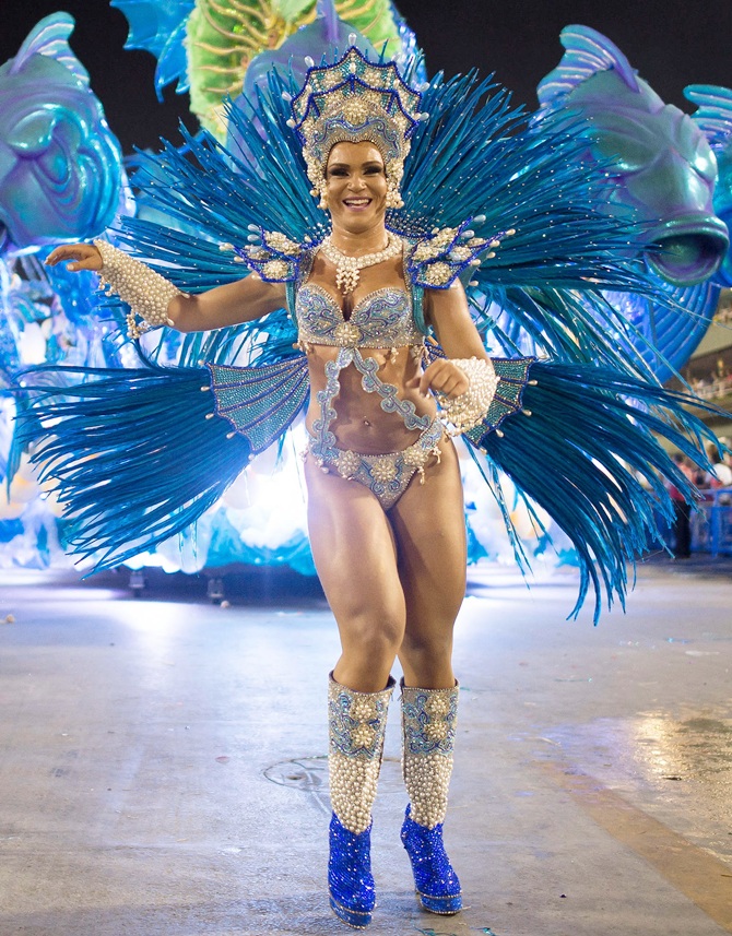 A member of Salgueiro Samba School performs during their parade at 2014 Brazilian Carnival