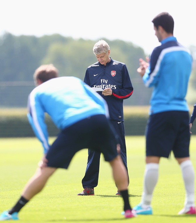 Arsene Wenger of Arsenal looks on during a training session ahead of the FA Cup Final match between Arsenal and Hull City