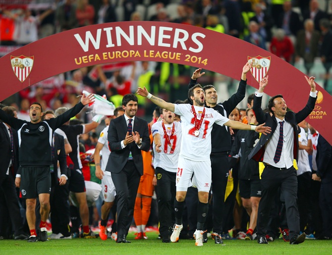Nicolas Pareja of Sevilla celebrates victory with team mates after the UEFA   Europa League Final match against SL Benfica at Juventus Stadium