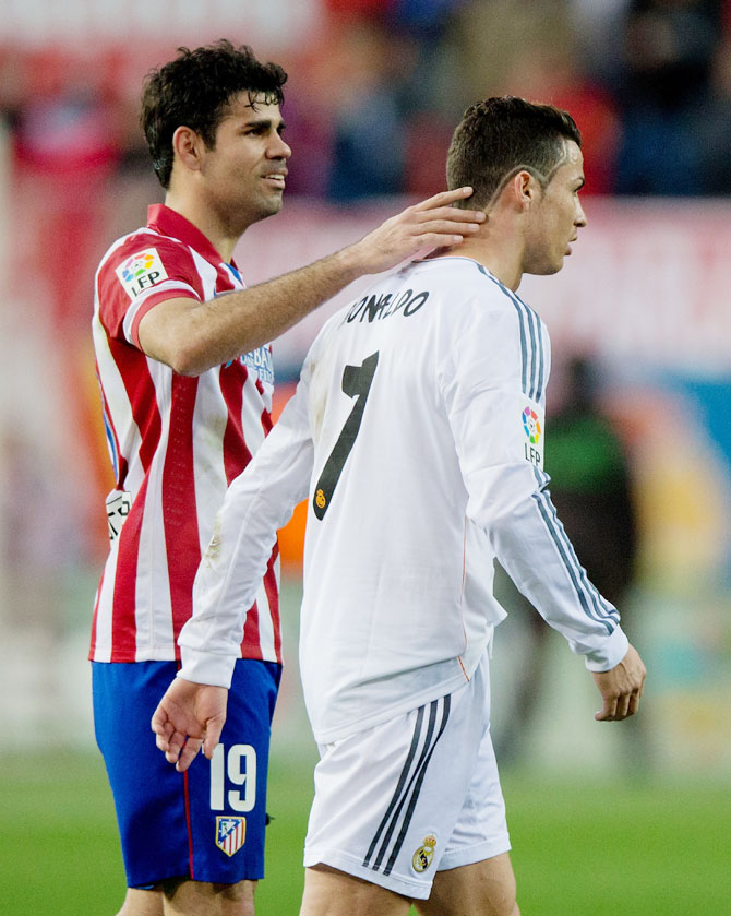 Diego Costa (left) of Atletico de Madrid and Cristiano Ronaldo of Real Madrid