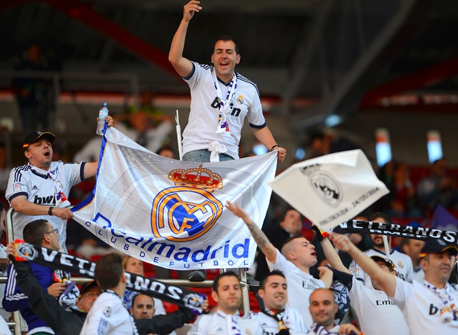 A Real Madrid fan shows his colours