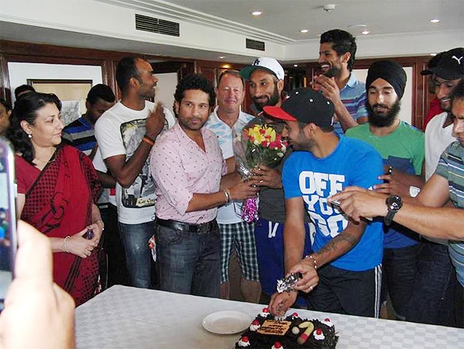 Sachin Tendulkar sees off the Indian Hockey team before their departure on Tuesday for the hockey World Cup