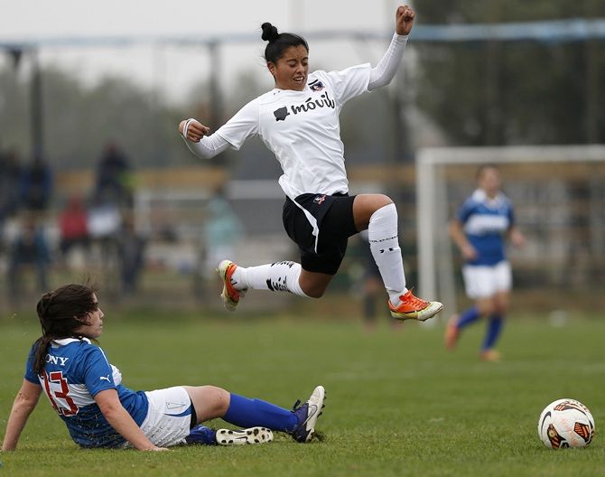 Claudia Soto (top) of Colo Colo women's soccer club jumps of a rival from Universidad Catolica during a match in Santiago. (Image used for representational purposes)