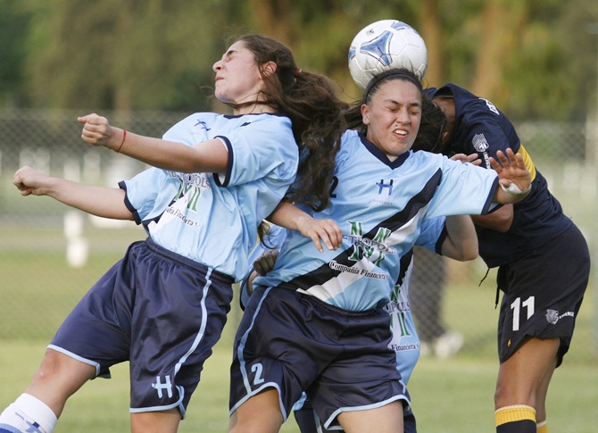 Women soccer players in action