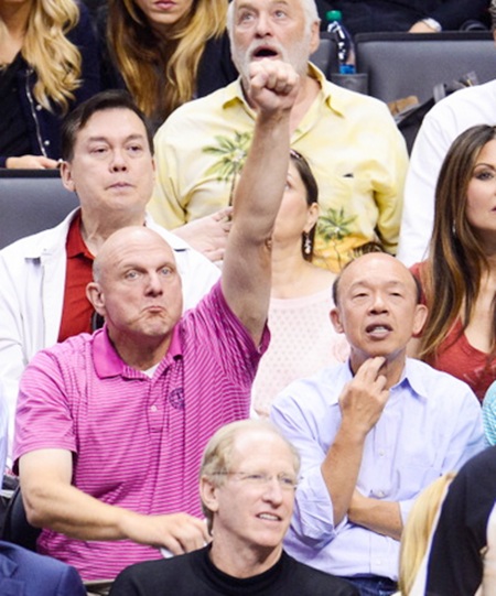 Steve Ballmer,left, attends an NBA playoff game