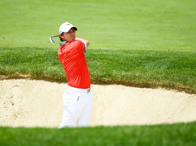 Rory McIlroy of Northern Ireland hits his second shot on the first hole during the first round of the Memorial Tournament