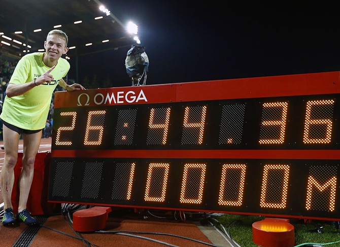 Galen Rupp of USA pose for a photo after setting an American record