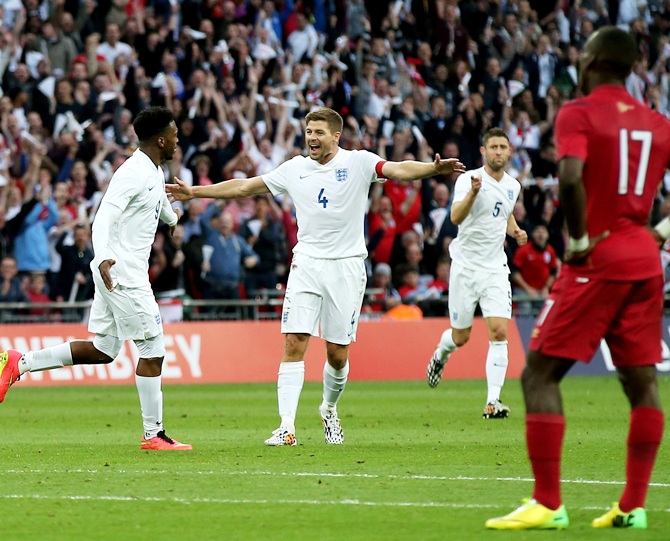 Steven Gerrard of England congratulates Daniel Sturridge of England on scoring the opening goal