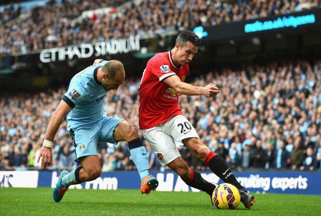 Manchester City beat 10-man United in derby - Rediff Sports