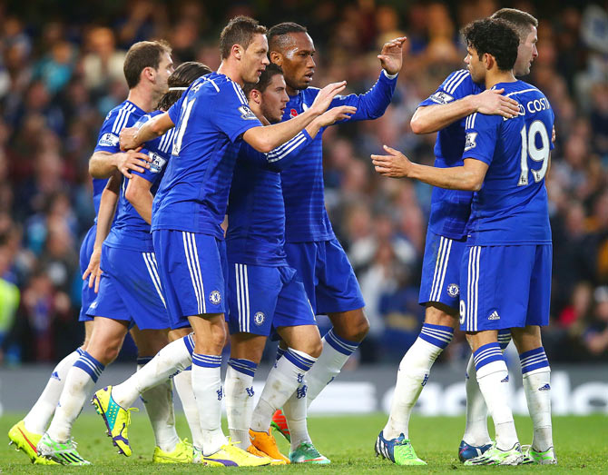 Chelsea players celebrate a goal