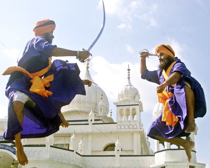 Holy Sikh warriors practice Gatka