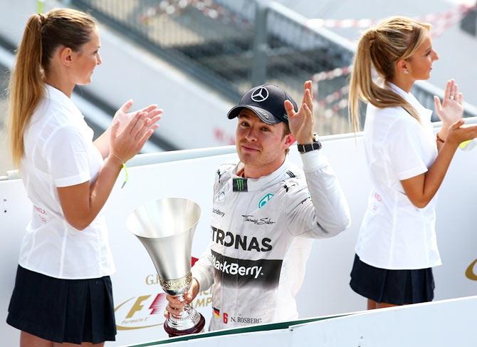 Nico Rosberg of Germany and Mercedes GP celebrates following his second place finish during the F1 Grand Prix of Italy at Autodromo di Monza