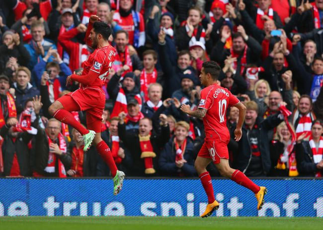 Emre Can of Liverpool celebrates scoring the opening goal during the Barclays Premier League match against Chelsea at Anfield on Saturday