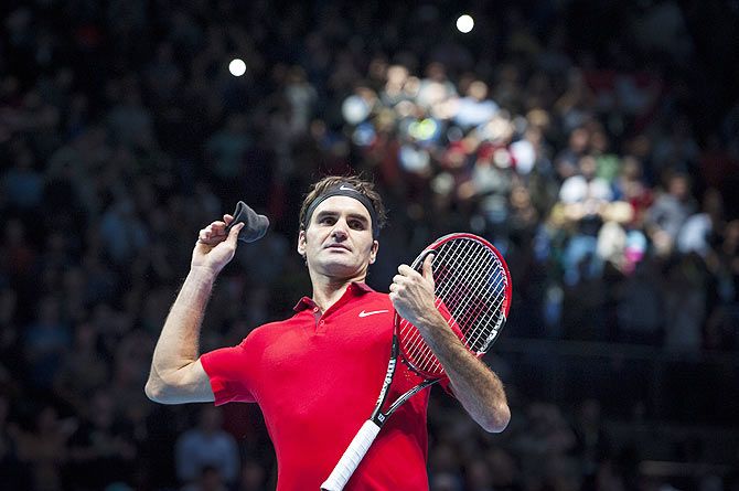 Roger Federer of Switzerland celebrates his victory after his match against Milos Raonic of Canada on Sunday